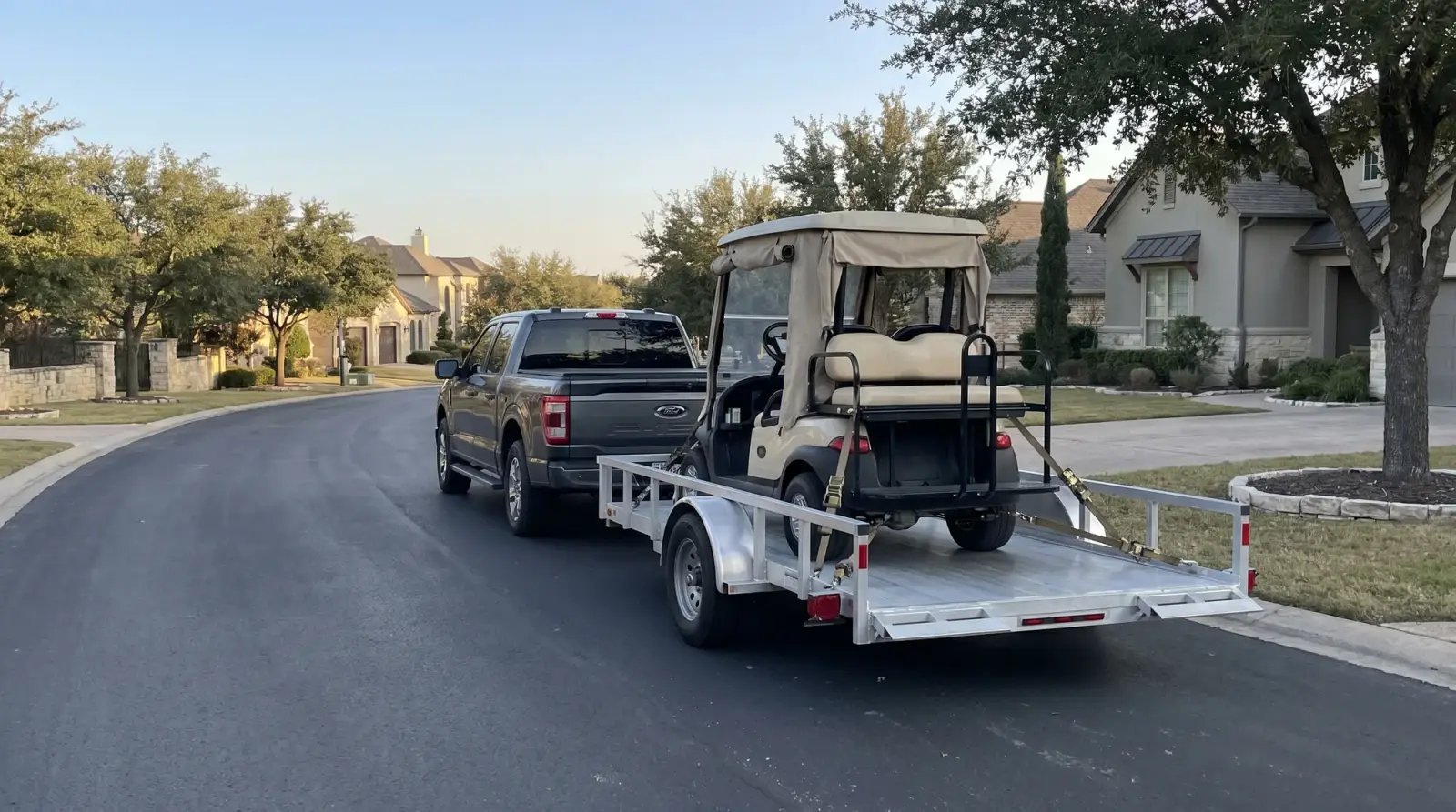 Transporting and towing a golf cart