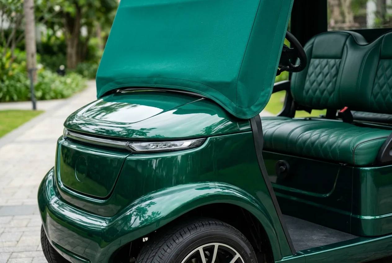 Close-up of a custom-coloured electric buggy panel with a clean logo and matched trim